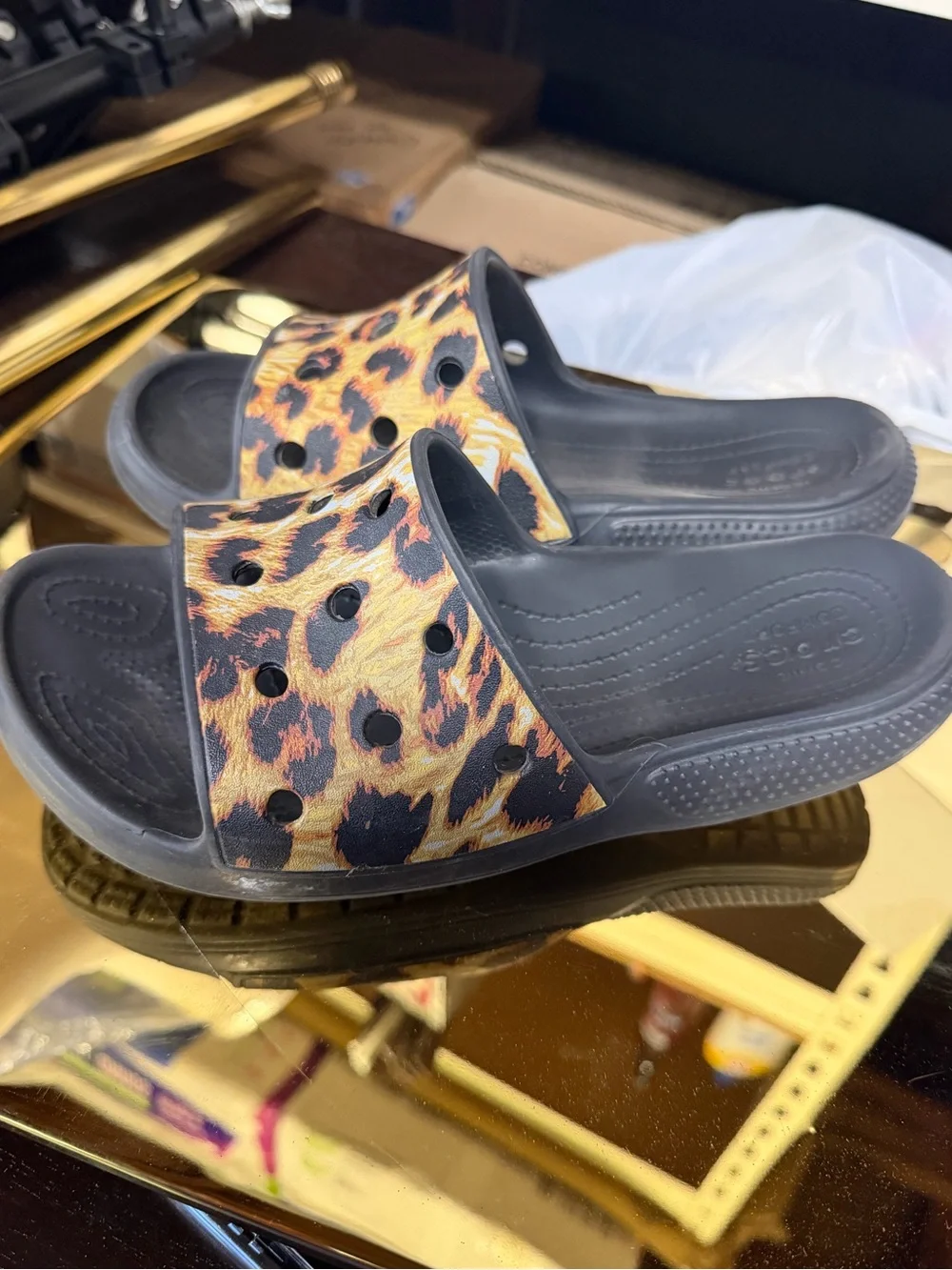 Crocs Classic Animal Print Slide Sandals featuring a leopard pattern SZ 10